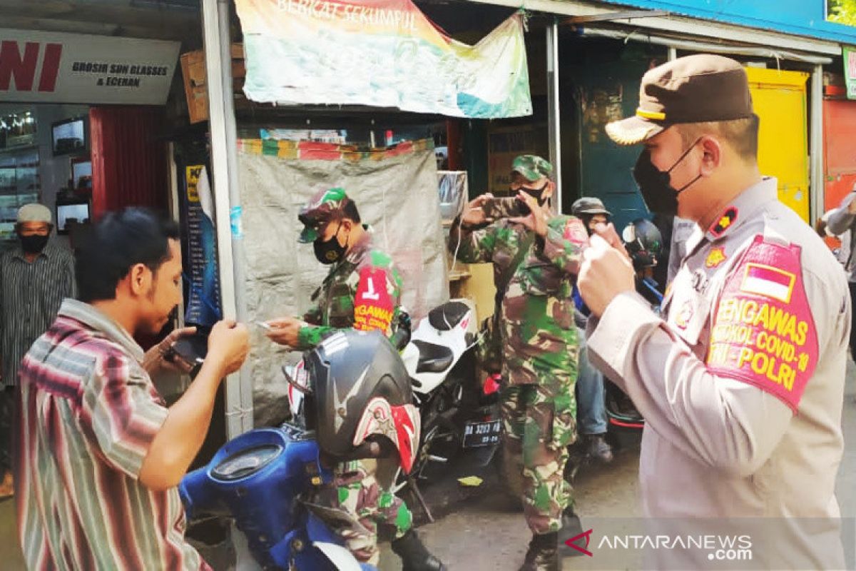 Tiga Pilar Banteng gelar patroli pasar tegakan prokes cegah COVID-19 di Banjarmasin