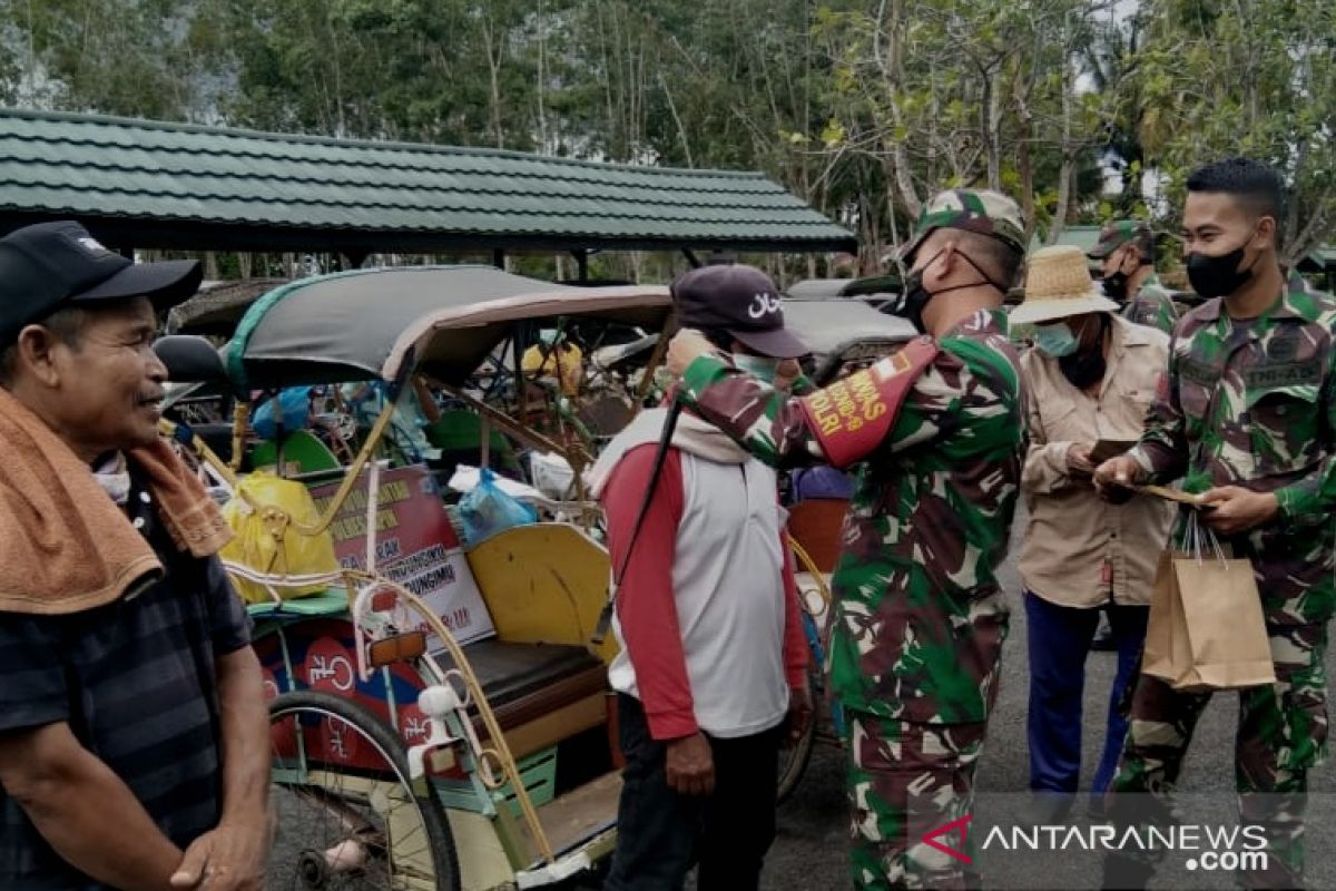 Kodim 1010 Rantau jadikan tukang becak duta masker