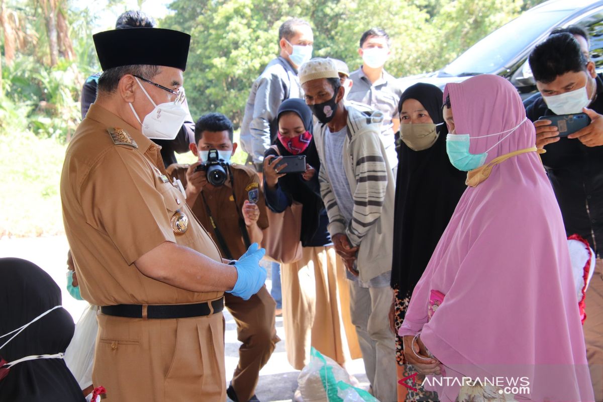 112 KK terdampak banjir di Karang Paci Kalumpang terima bantuan beras