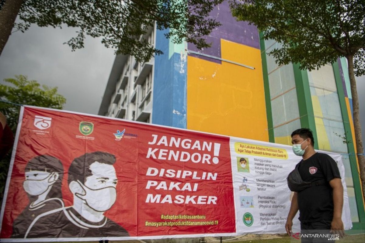Bisakah Indonesia menyusul pencapaian lepas masker di Amerika Serikat?