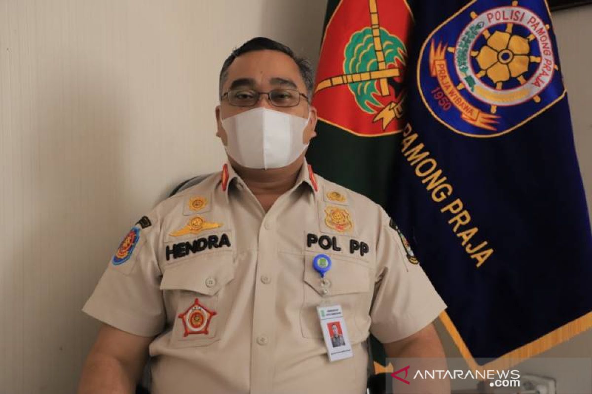 Satpol PP Kota Tangerang bantu pengamanan tes cepat antigen di pasar tradisional