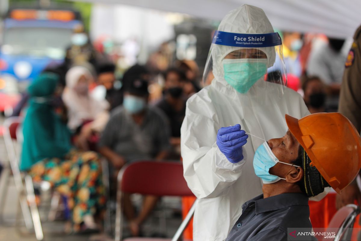 Indonesia adds 21,095 COVID-19 cases in single day