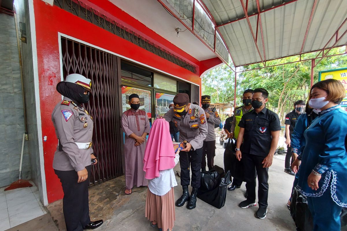 HUT Bhayangkara, Polres Dumai bhakti sosial dan penyuluhan prokes