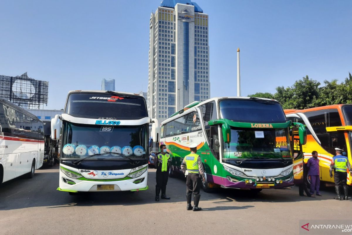Jakarta Metro Police impound 36 buses for flouting PPKM rules