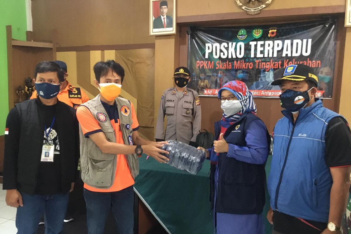 West Java BNPB distributes 134,000 masks through PPKM posts