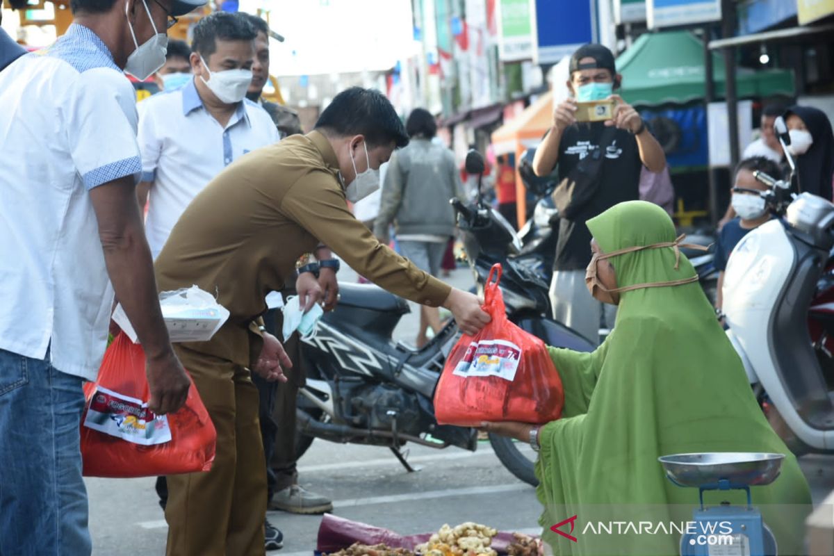 Sebagian besar masyarakat di pasar terapkan prokes