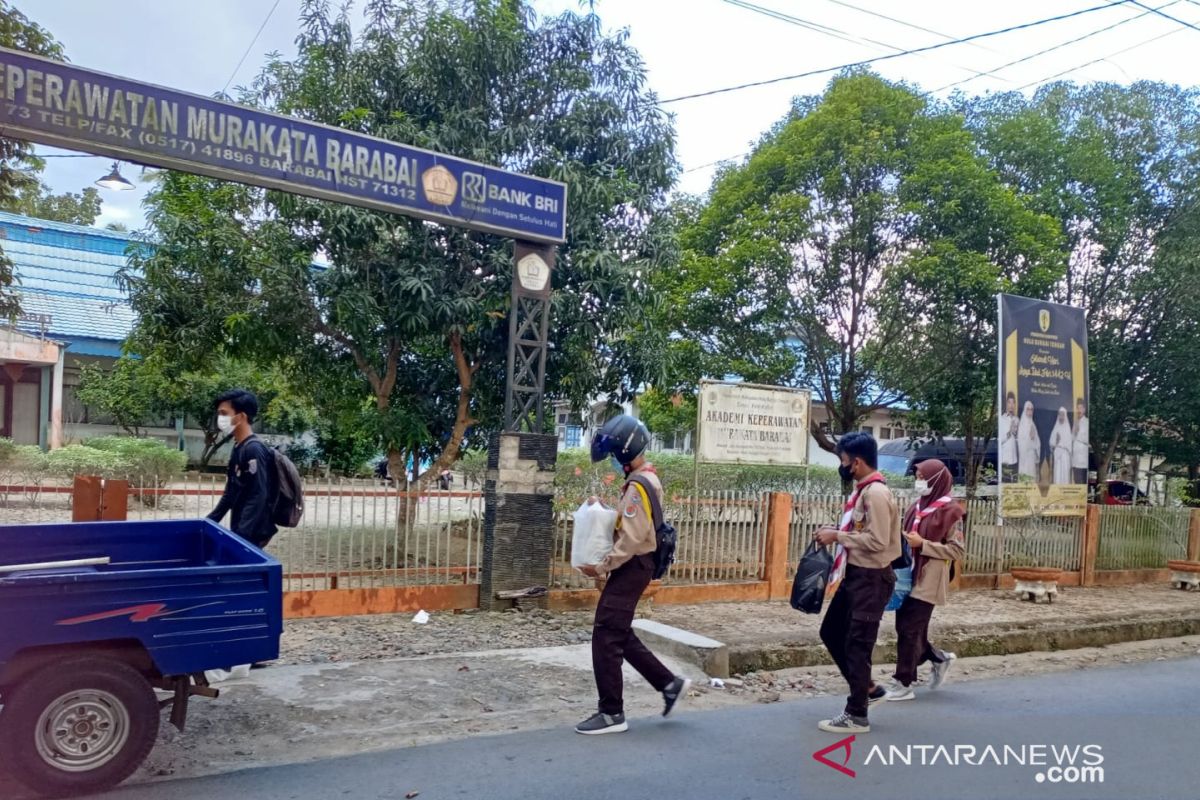 Pramuka Peduli Kwarcab HST berbagi di tengah pandemi