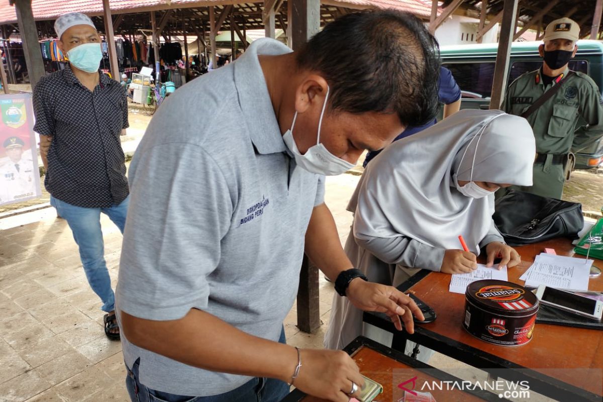 Diskopdag Tanah Laut kembali melakukan tera ulang ke pasar