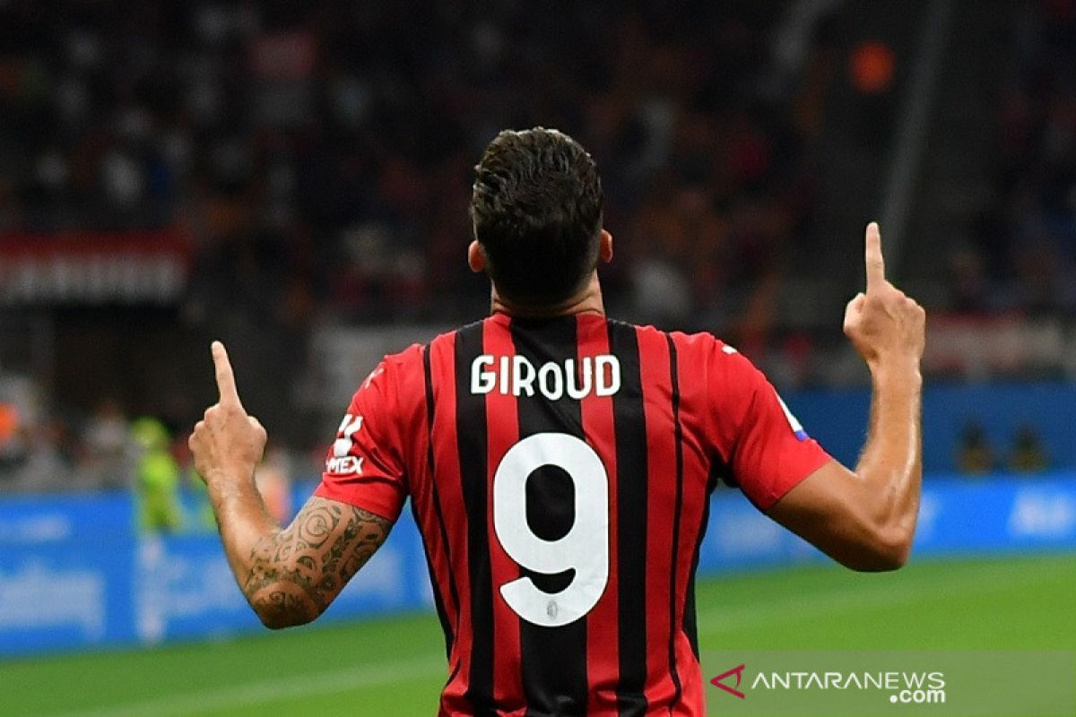 Olivier  Giroud buka tabungan gol kala bantu AC Milan lahap Cagliari 4-1