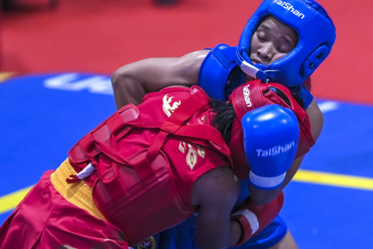 PON Papua - Junita Malau pertahankan  medali emas wushu sanda 48kg