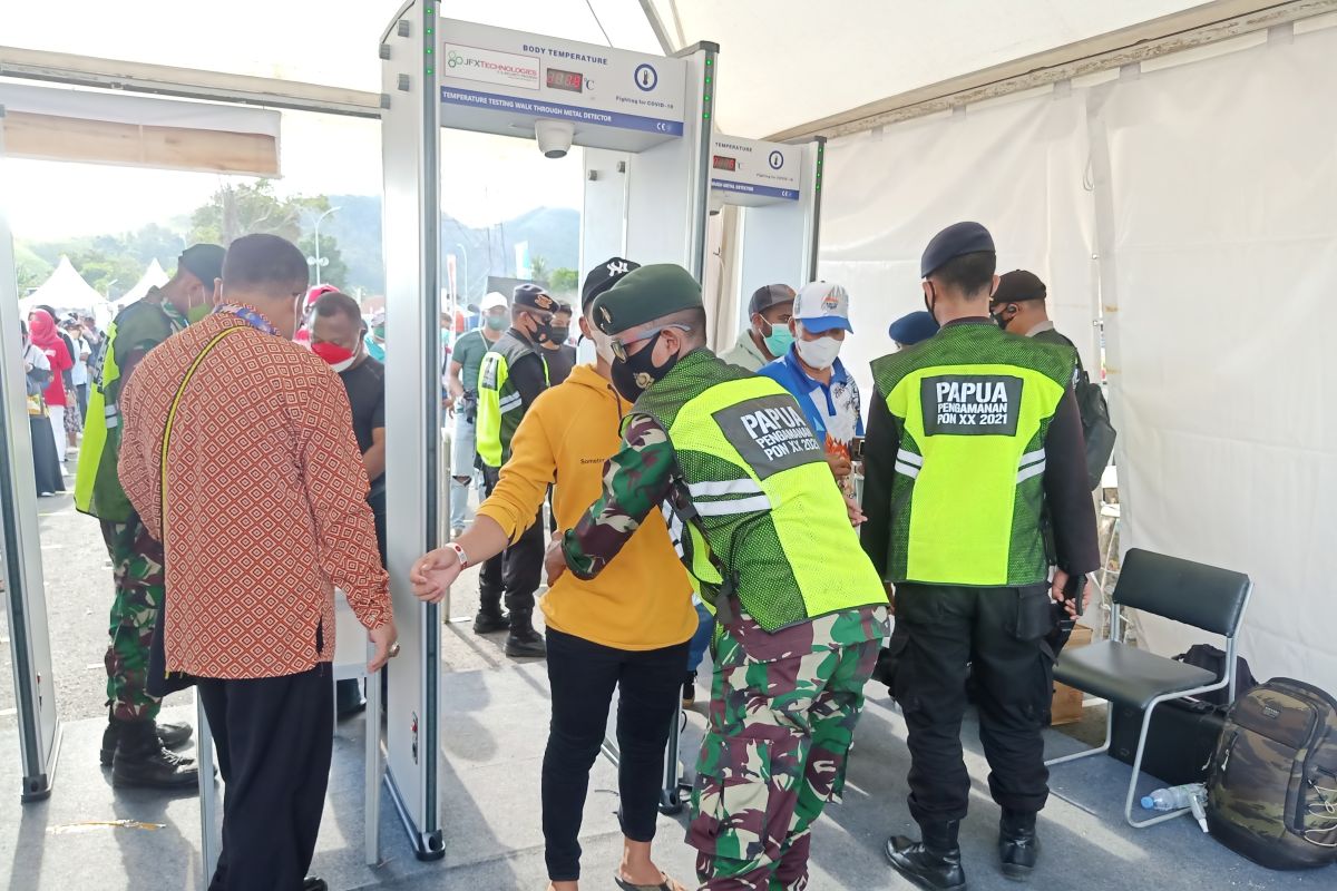 Spectators go through four checkpoints to attend PON opening ceremony