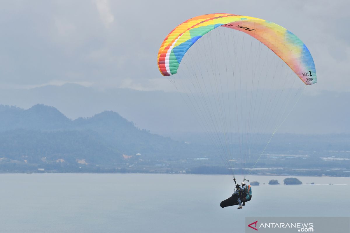 PON XX Papua-Jatim tercepat selesaikan tandem lintas alam paralayang