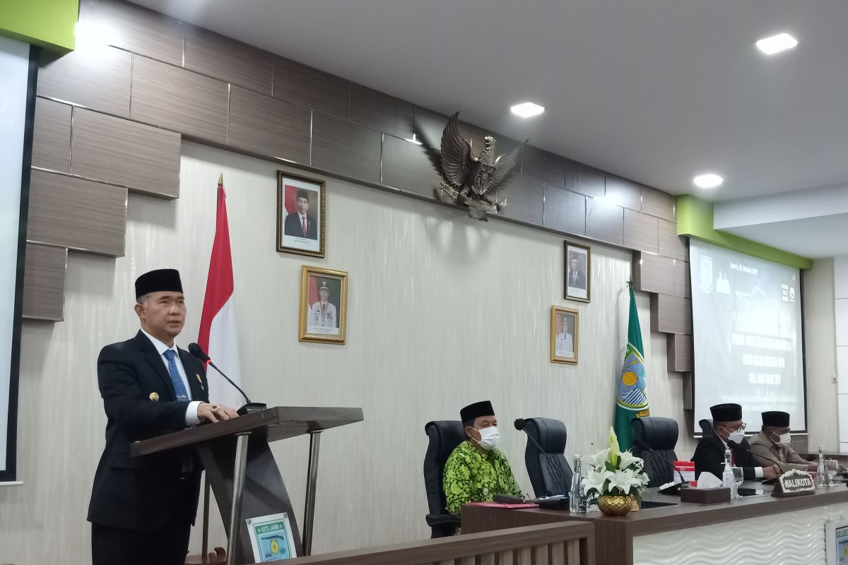 Membuka sekaligus memilih pengurus baru DMI Kota Jambi