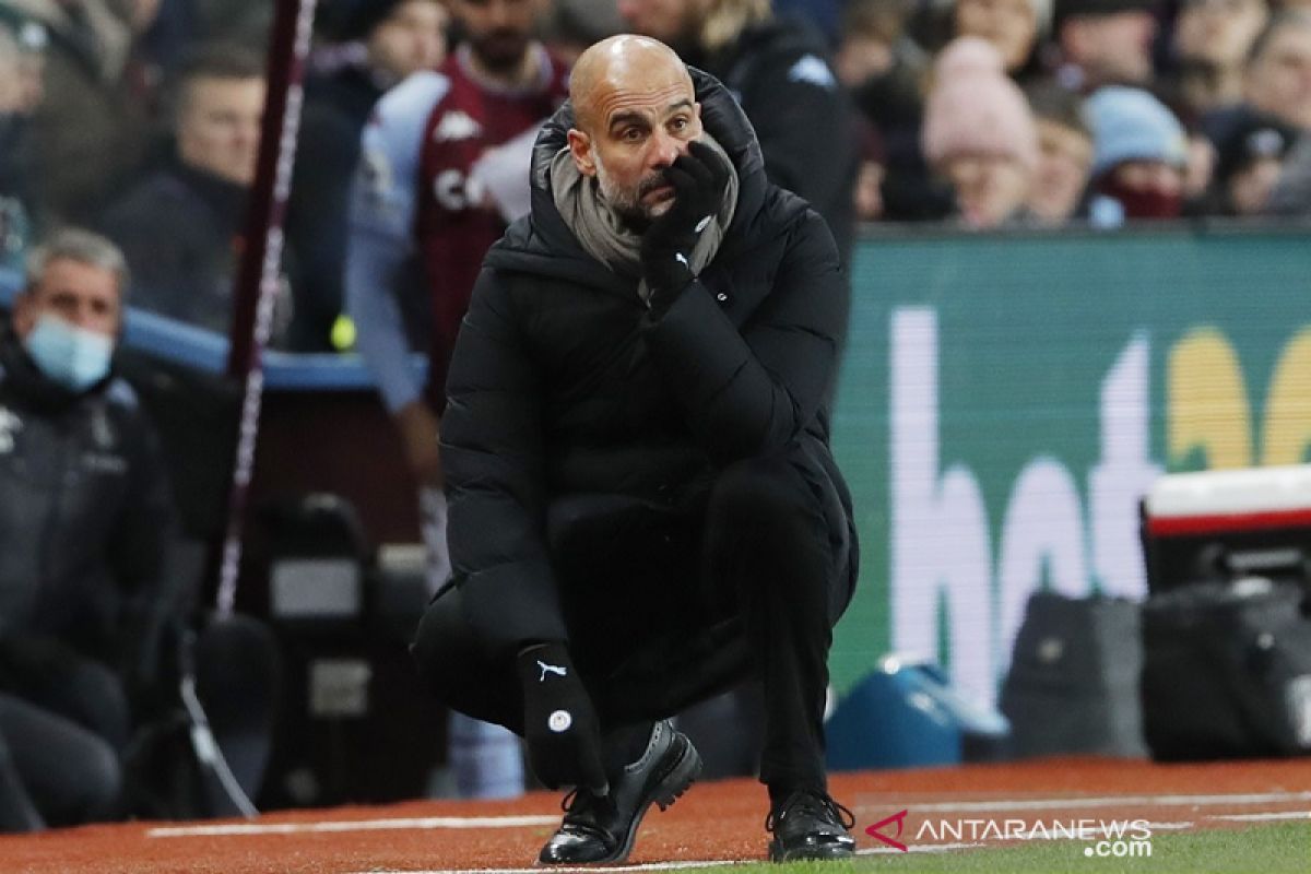 Guardiola desak fans untuk divaksin dan kenakan masker