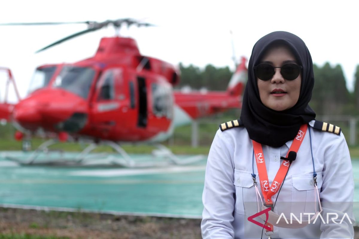 Indria Puji Astuti pilot heli 'water bombing' APP Sinarmas