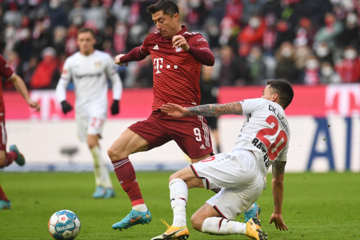 Muenchen  berbagi angka dengan Leverkusen