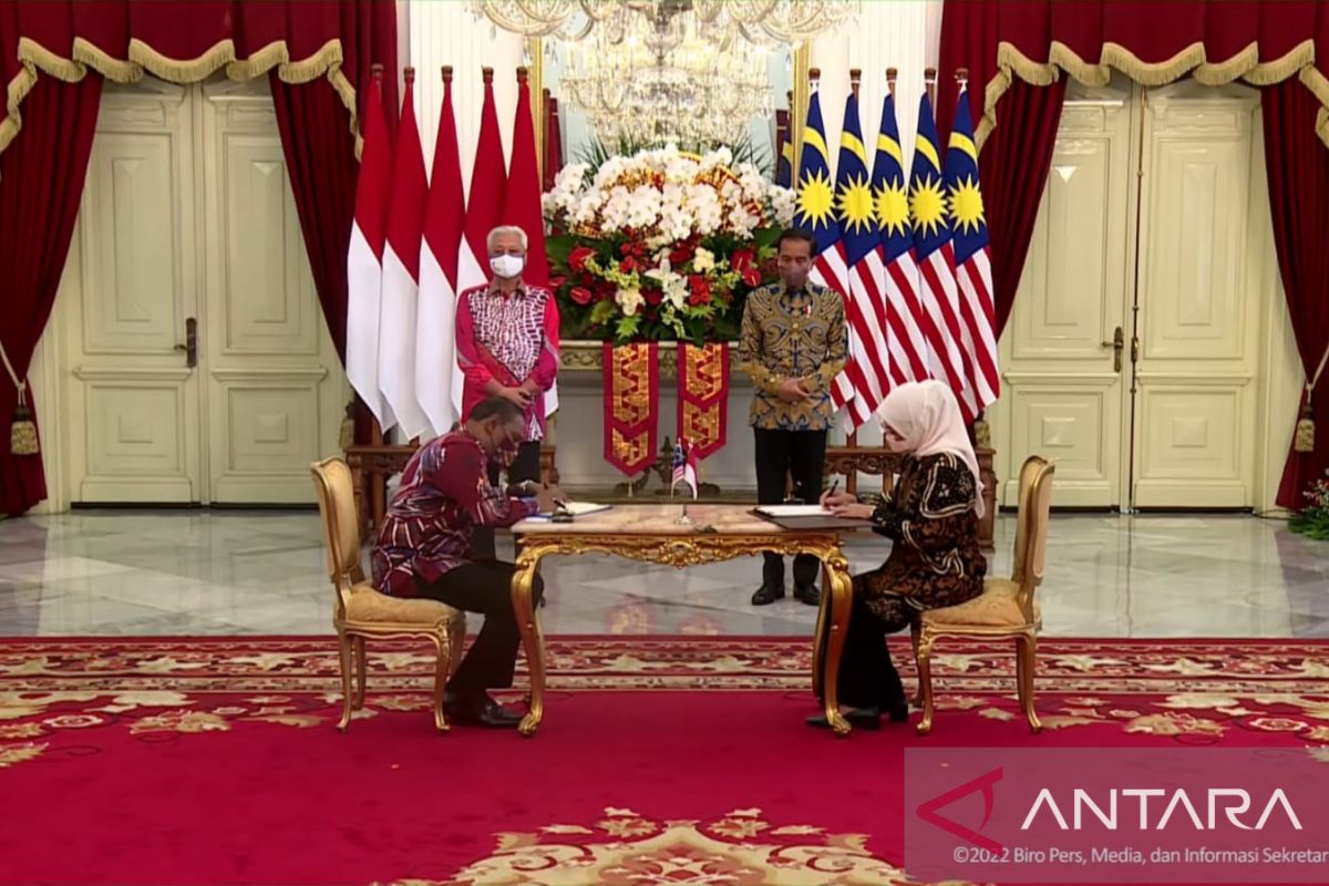 Indonesia, Malaysia ink MoU on migrant workers' protection