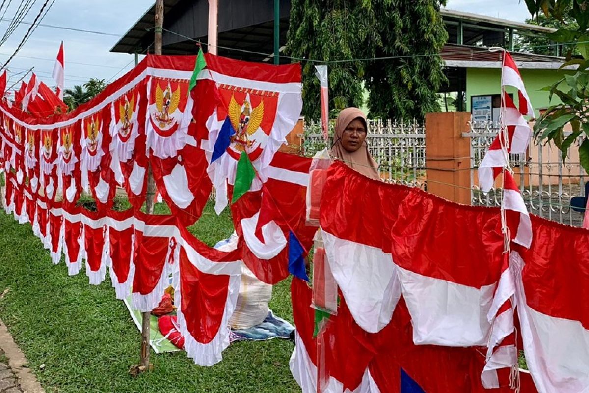 Penjual bendera dan umbul-umbul