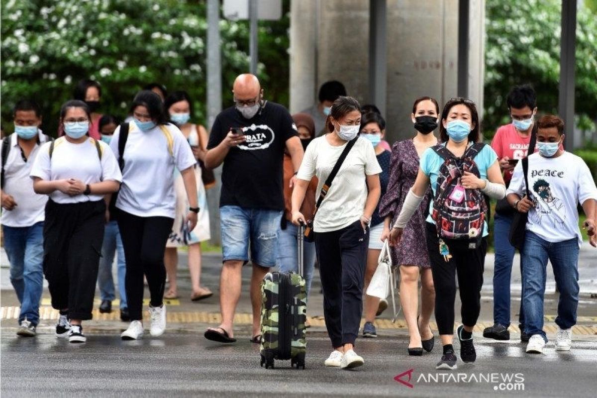 Pemerintah Singapura akan cabut aturan masker di dalam ruangan pekan depan