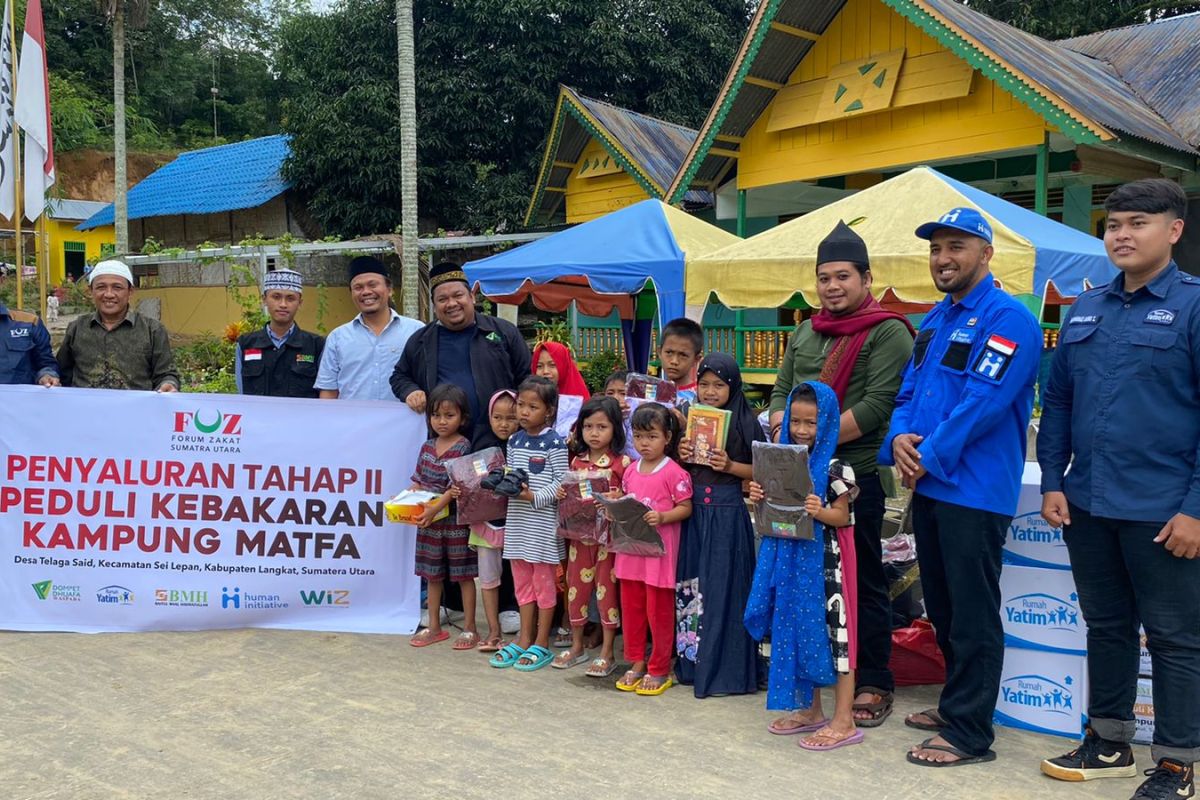 Dompet Dhuafa Waspada belikan sepatu sekolah baru bagi puluhan anak penyintas kebakaran di Langkat