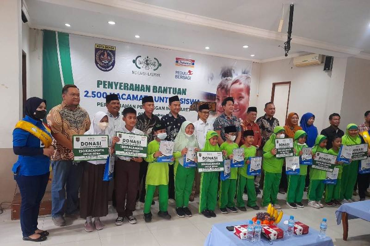 LAZISNU-Indomaret salurkan bantuan kacamata gratis di Depok