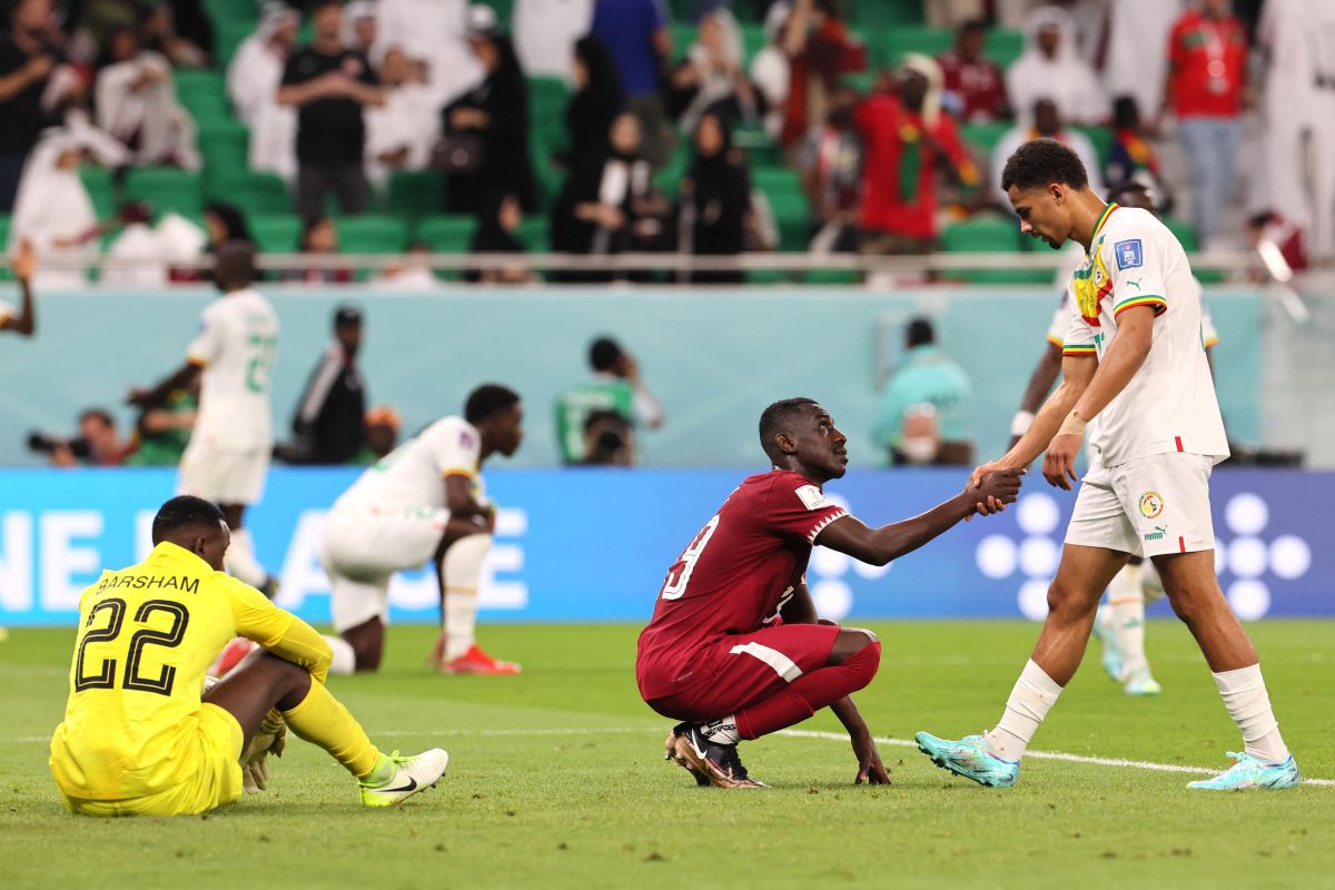 Piala Dunia : Asa tuan rumah Qatar lolos 16 besar hilang, setelah takluk 1-3 dari Senegal