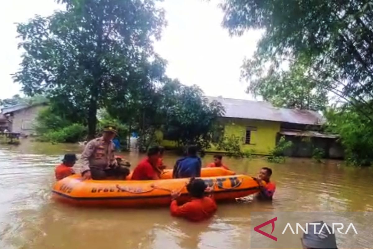 Tapin banjir akibat curah hujan tinggi