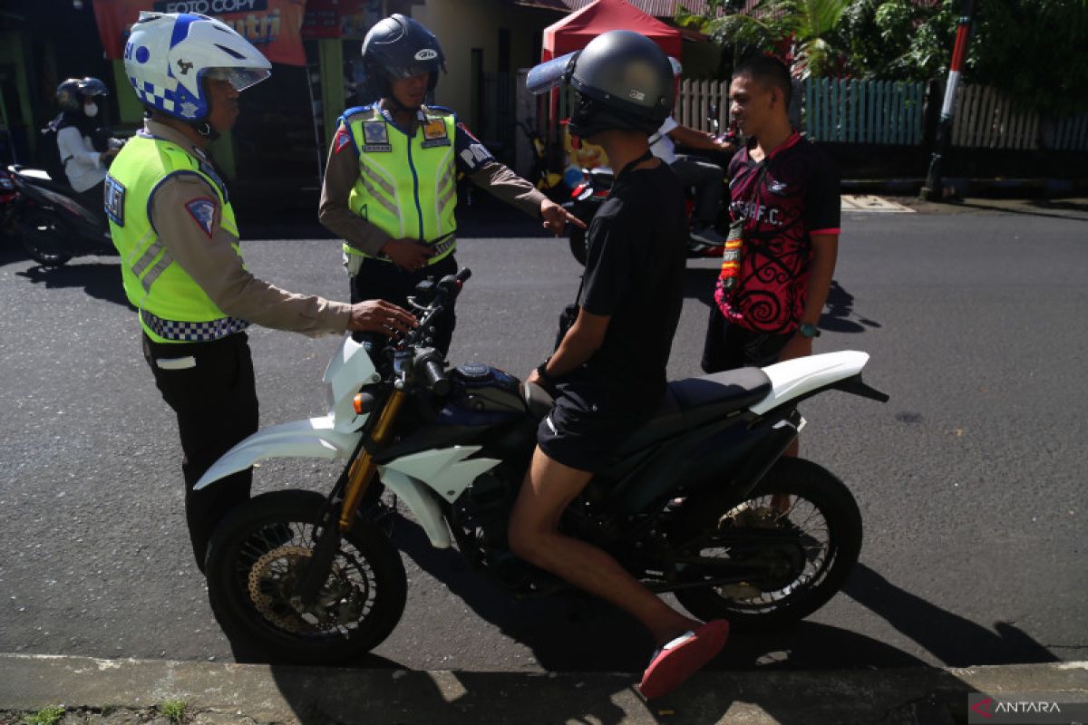 Ketika polisi kembali berlakukan tilang manual