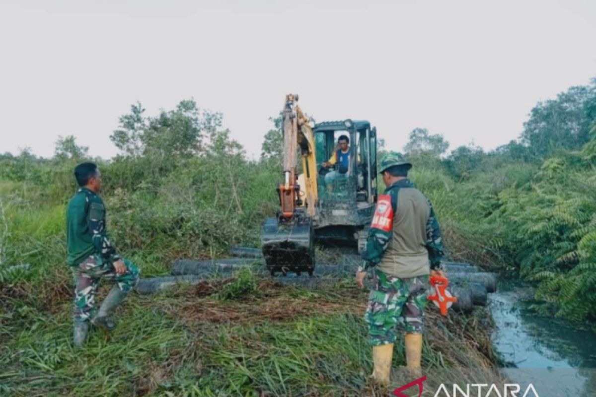 TMMD Kodim 0418/ Palembang bangun 865 meter jalan di pinggiran kota