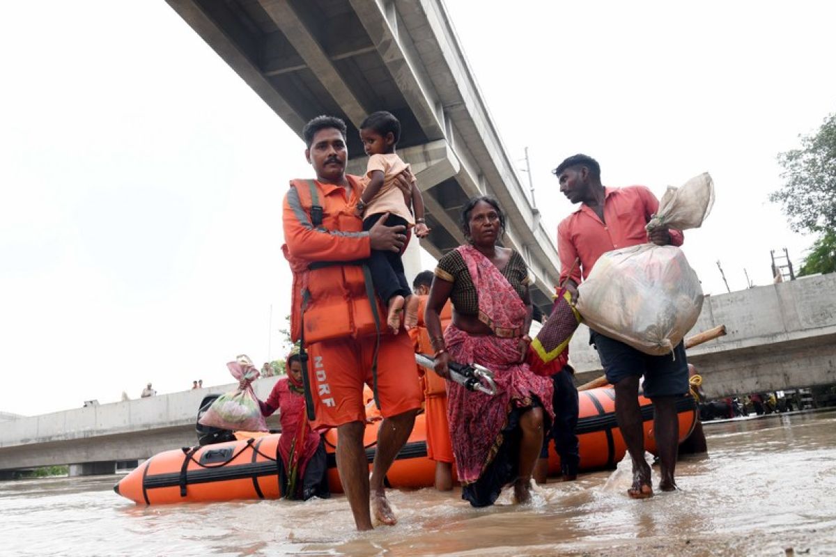 Album Asia: Mengintip ibu kota India yang sedang diterpa banjir