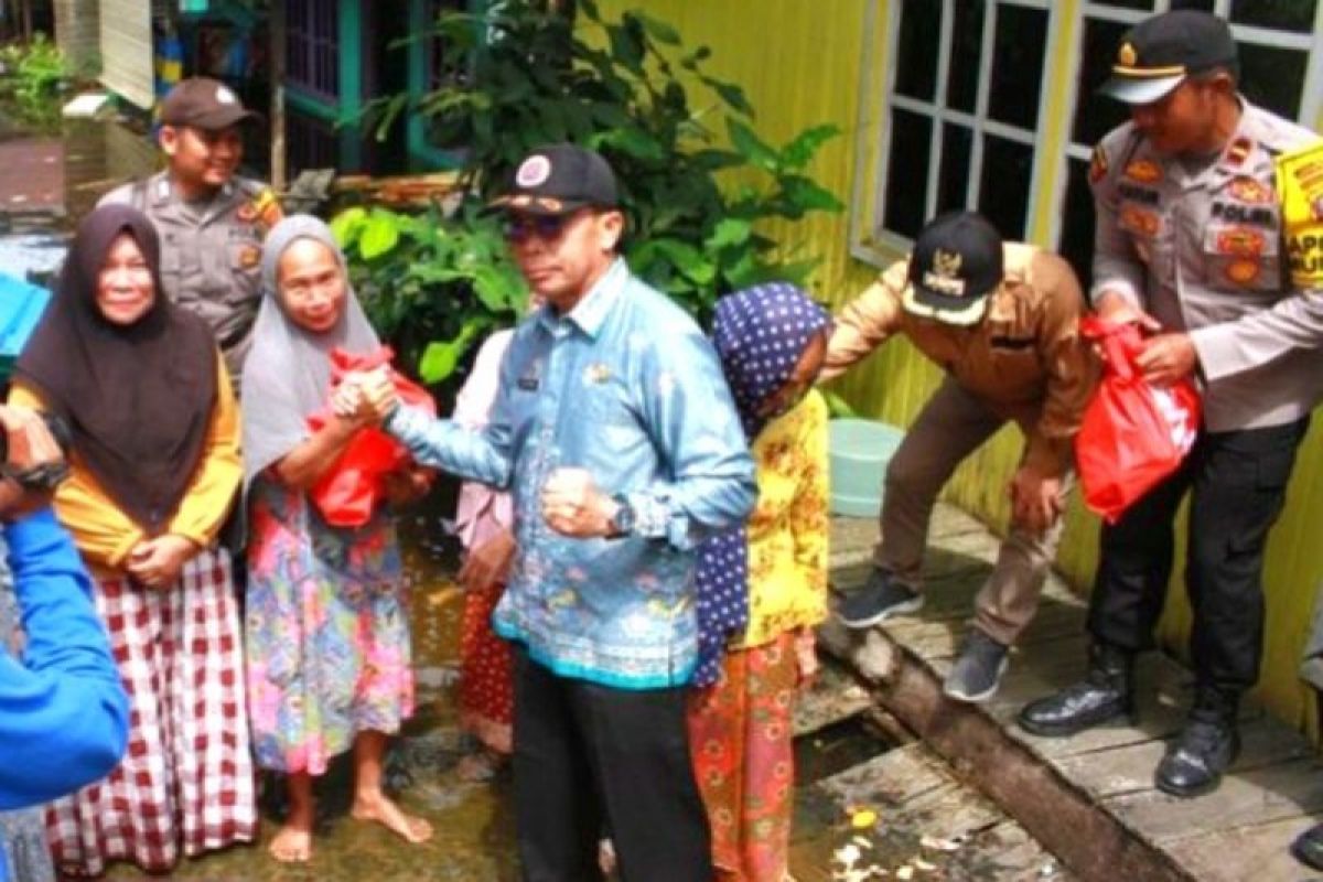 Penjabat Bupati Murung Raya pantau banjir dan minta warga tetap siaga