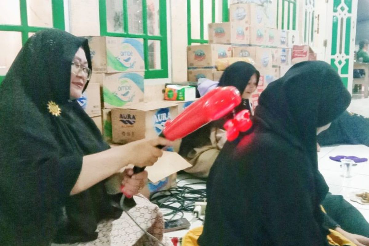 Warga Maburai layani pijat gratis bagi jamaah Haul Guru Sekumpul