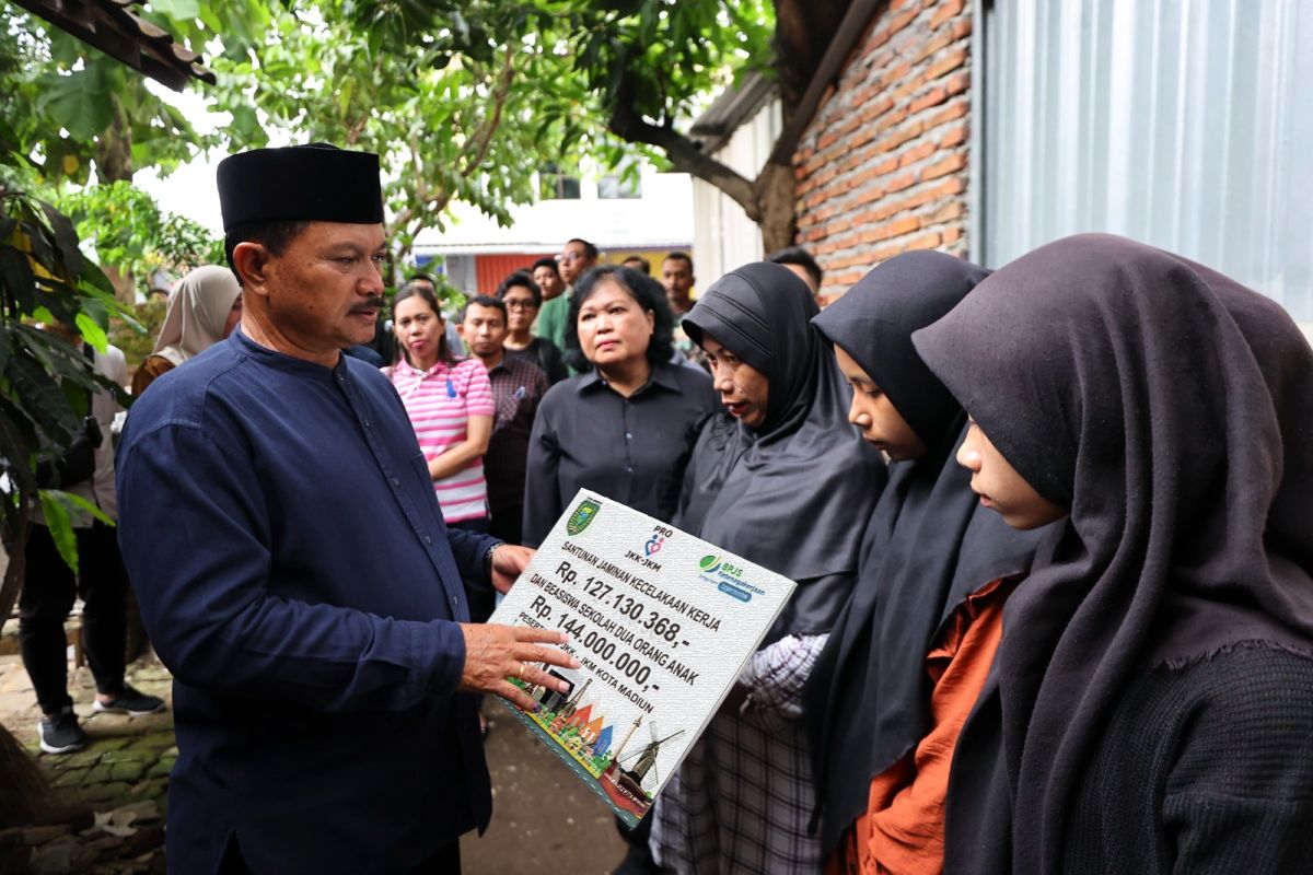 Keluarga Satlinmas Madiun yang wafat saat pemilu dapat santunan BPJS