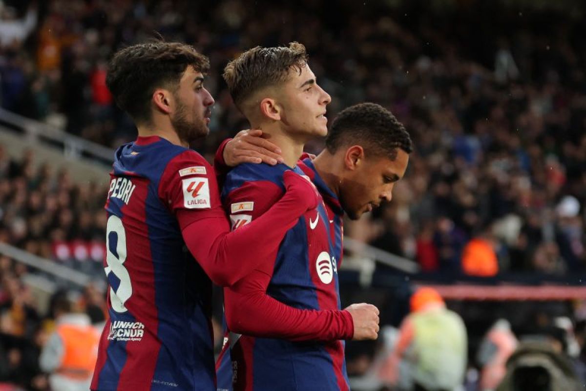 Barcelona gusur Girona, Atletico Madrid imbang