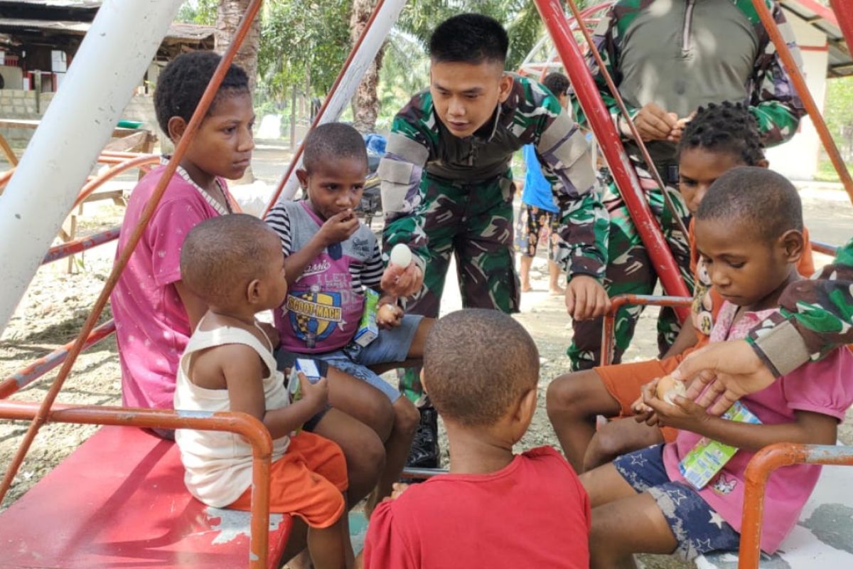 Yonif/122/TS berbagi kasih bersama anak panti asuhan peringati HAN