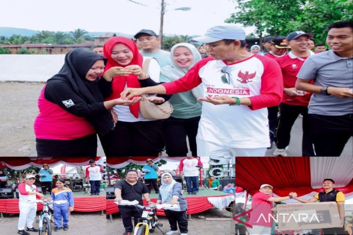 Semarak jalan santai, Pj. Bupati Palas bagikan kupon doorprize ke peserta