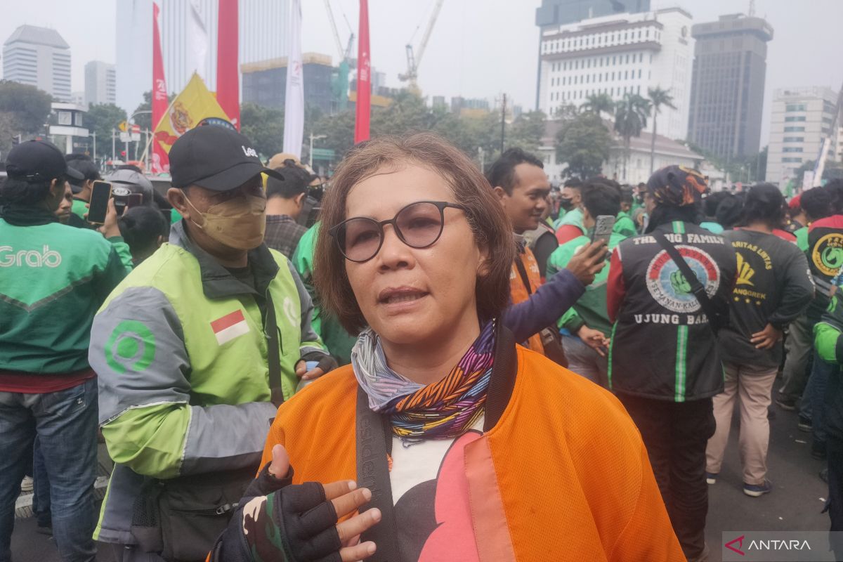 Wanita pengemudi ojol keluhkan sistem skors di dalam aplikasi