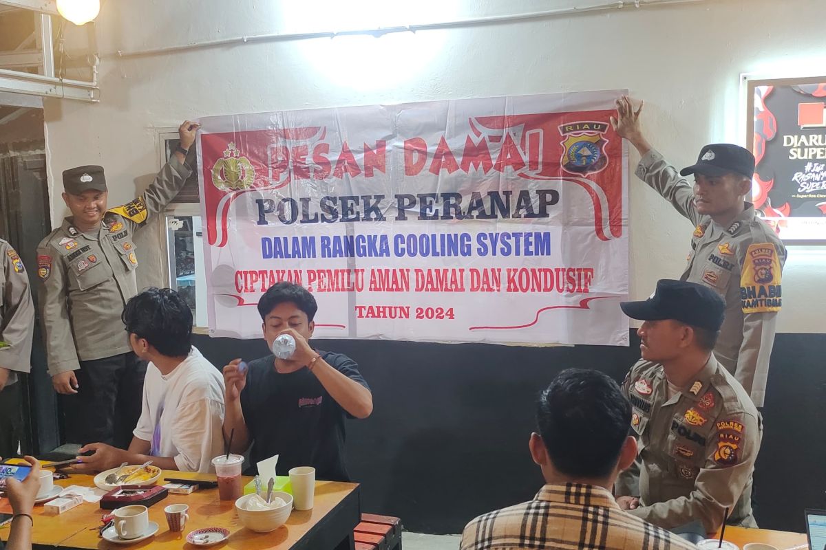 Kapolsek Peranap gerilya di warkop sosialisasi pilkada damai