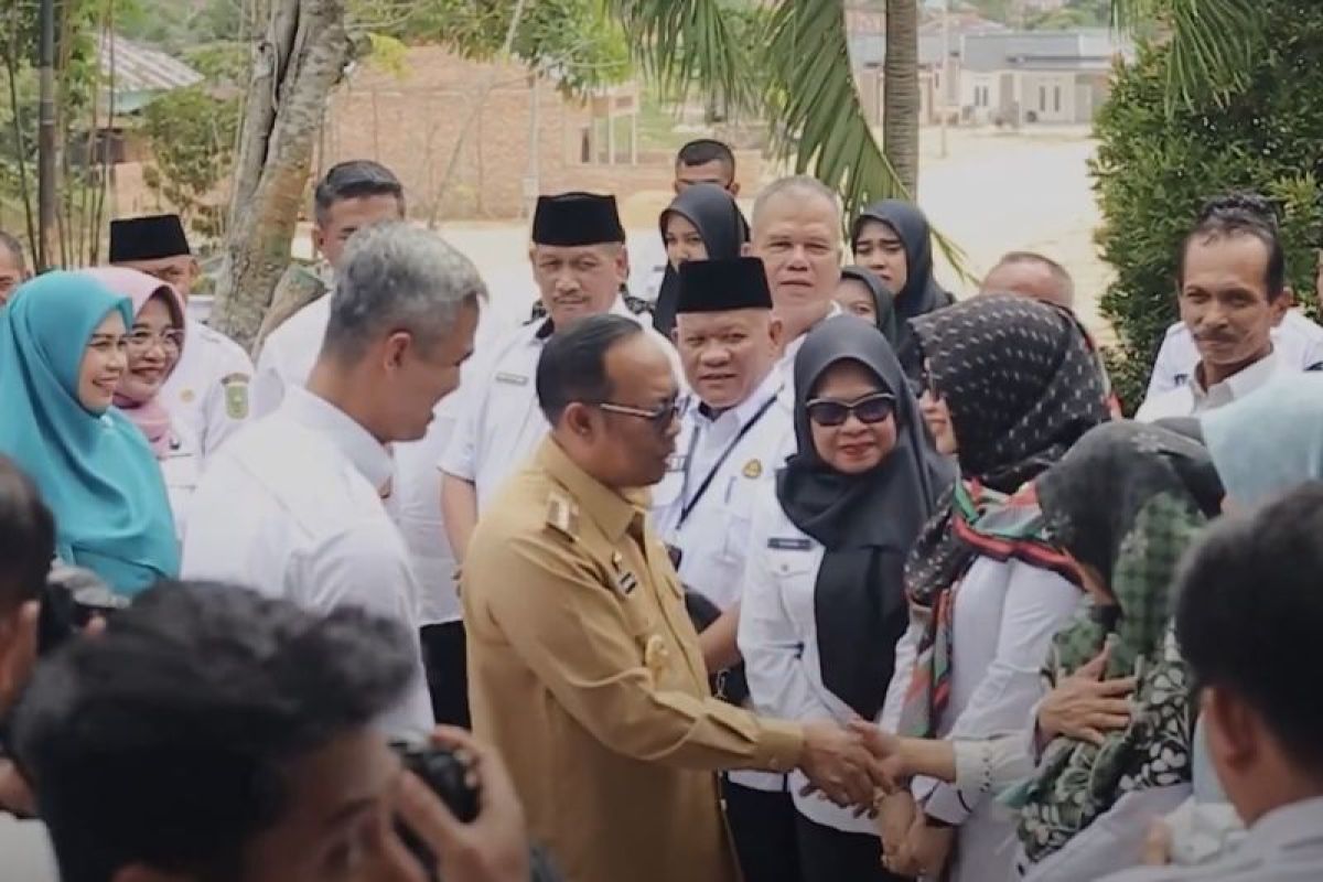 GALERI FOTO - Pj Gubri hadiri simulasi makan siang gratis di Pekanbaru