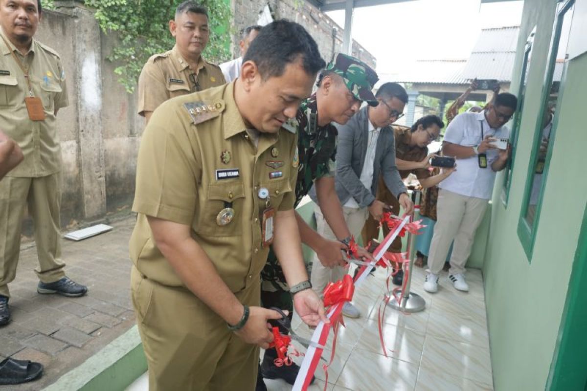 Pj Wako Pangkalpinang gunting pita bedah rumah program CSR PT Angkasa Pura