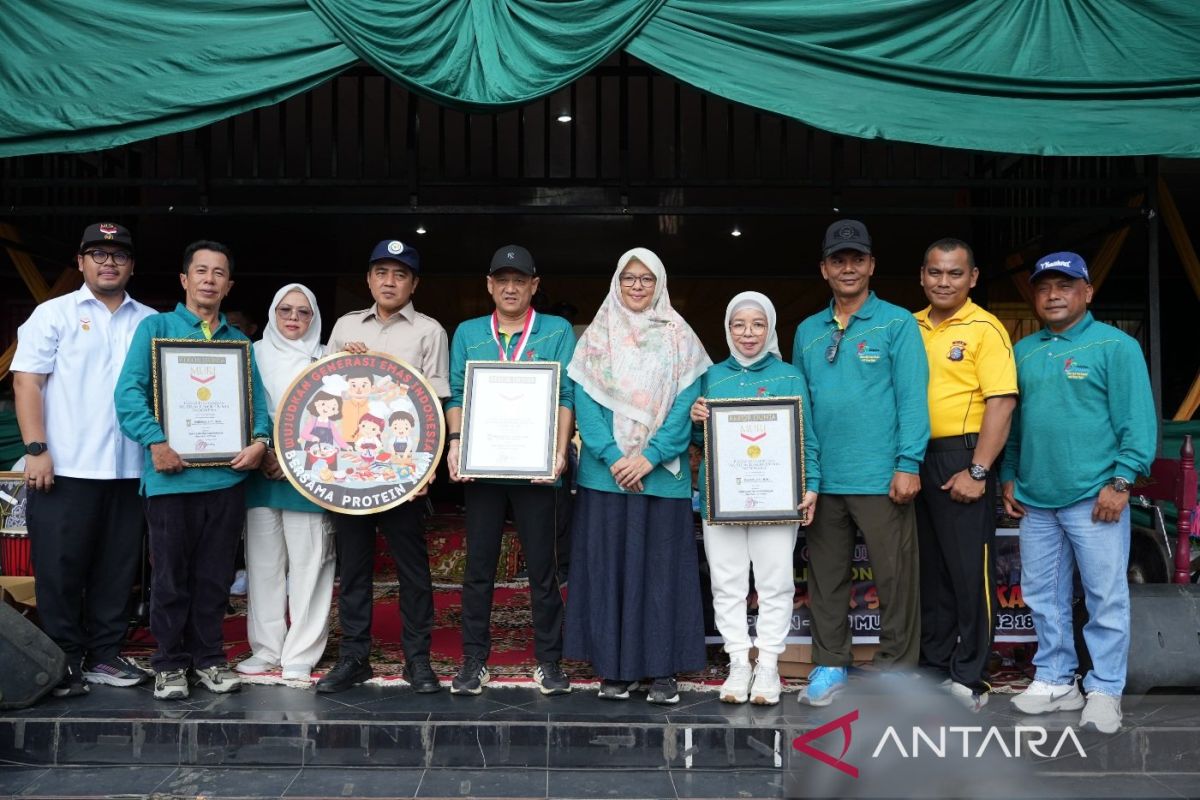 Kabupaten Kampar Raih Rekor Muri Porsi Ikan Patin Terbanyak