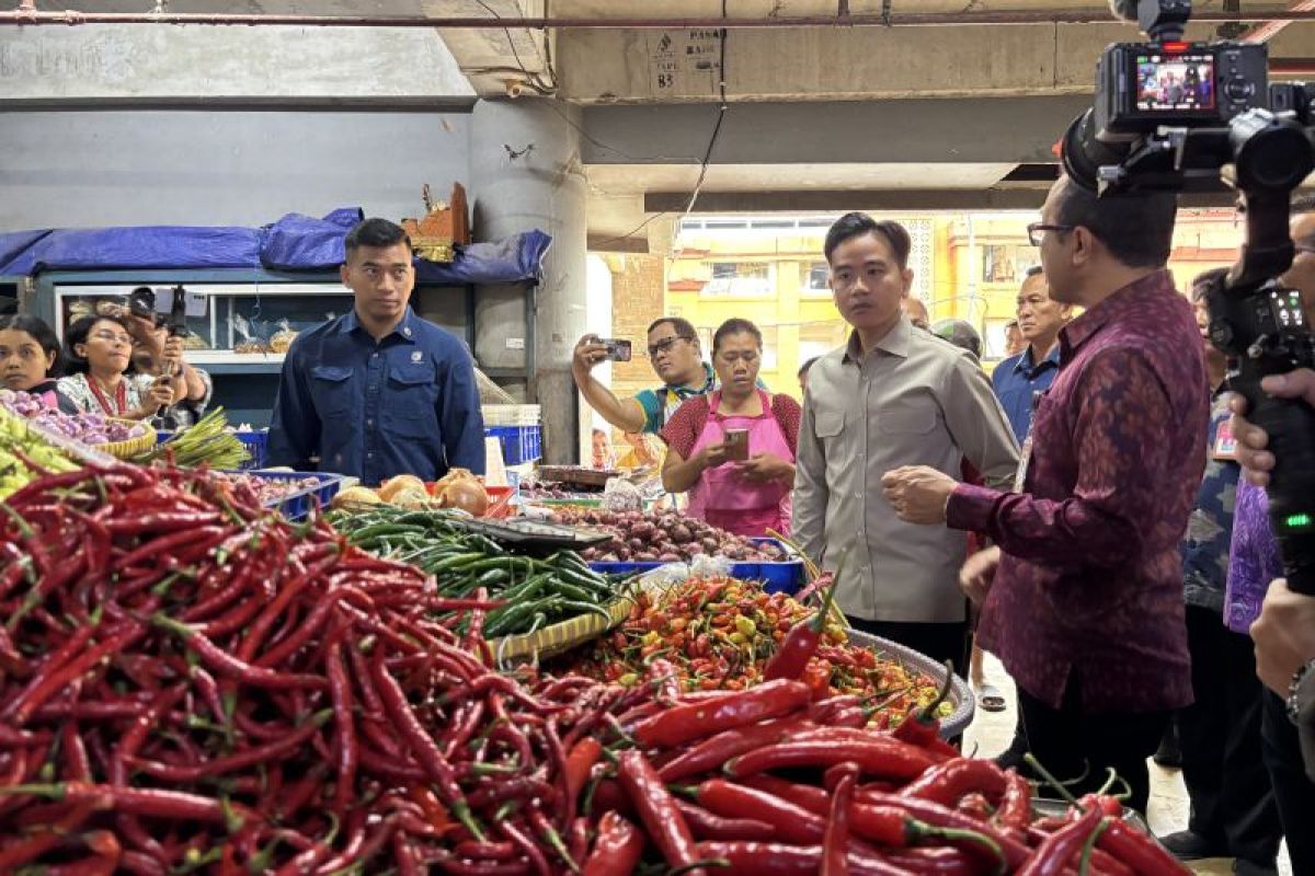 Indonesia's VP Gibran pushes digital payments in traditional markets