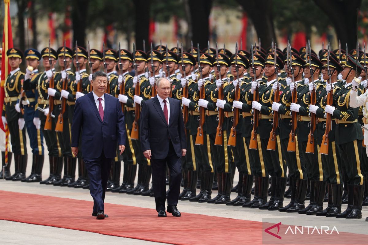 Sorotan dunia! Intip momen hangat Xi Jinping sambut Vladimir Putin di Beijing hari ini