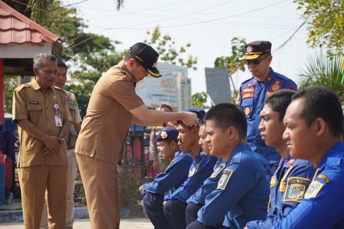 Bupati Paser Pimpin Pembaretan 66 Personel Baru Damkar