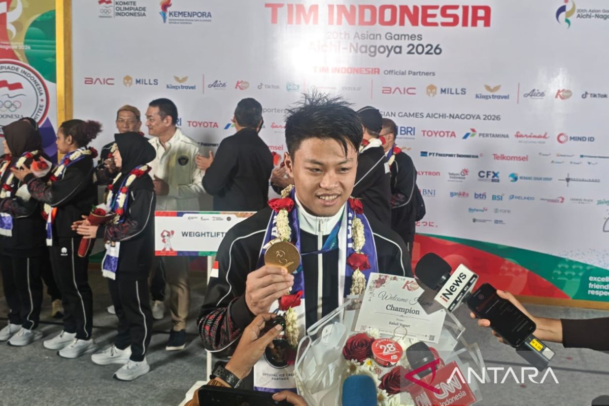 Ilustrasi berita Nasional: Lifter Rahmat Erwin persembahkan emas Asian Games bagi keluarga