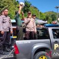 TNI Polri di Bukittinggi imbau warga tingkatkan nasionalisme dengan kibarkan bendera merah putih