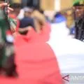 Pembentangan bendera merah putih 1 km Perbatasan RI-PNG Skouw