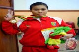Di kejuaraan dunia, lifter putri Indonesia Sri Hartati raih tiga emas