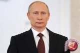  Putin memuji Chavez