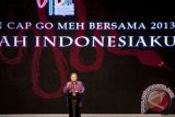 
Presiden Susilo Bambang Yudhoyono berpidato dalam perayaan Cap Go Meh Bersama 2013 yang di selenggarakan Forum Bersama Indonesia Tionghoa di JIExpo, Jakarta, Minggu (24/2). Presiden mengajak seluruh masyarakat menjaga kebersamaan dan mengutamakan kemajuan perekonomian meskipun pada tahun ini merupakan tahun politik. (ANTARA/Rosa Panggabean)